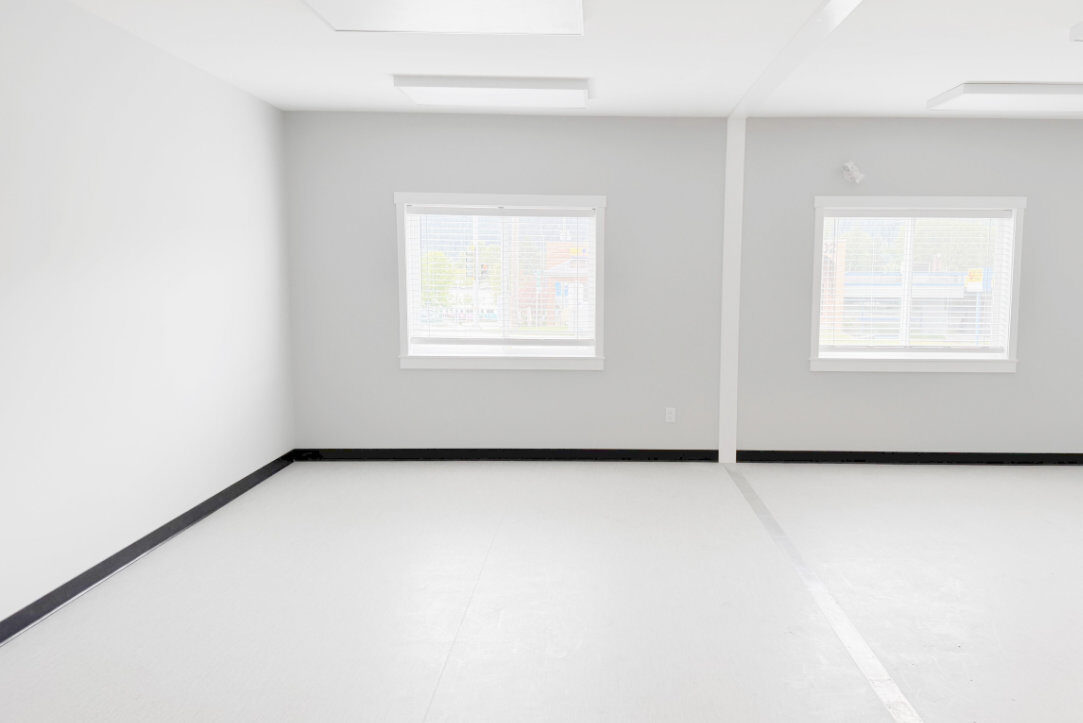 Interior room with two sliding windows